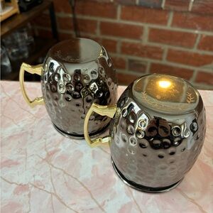 Set of Two Silver and Gold Hammered Mugs